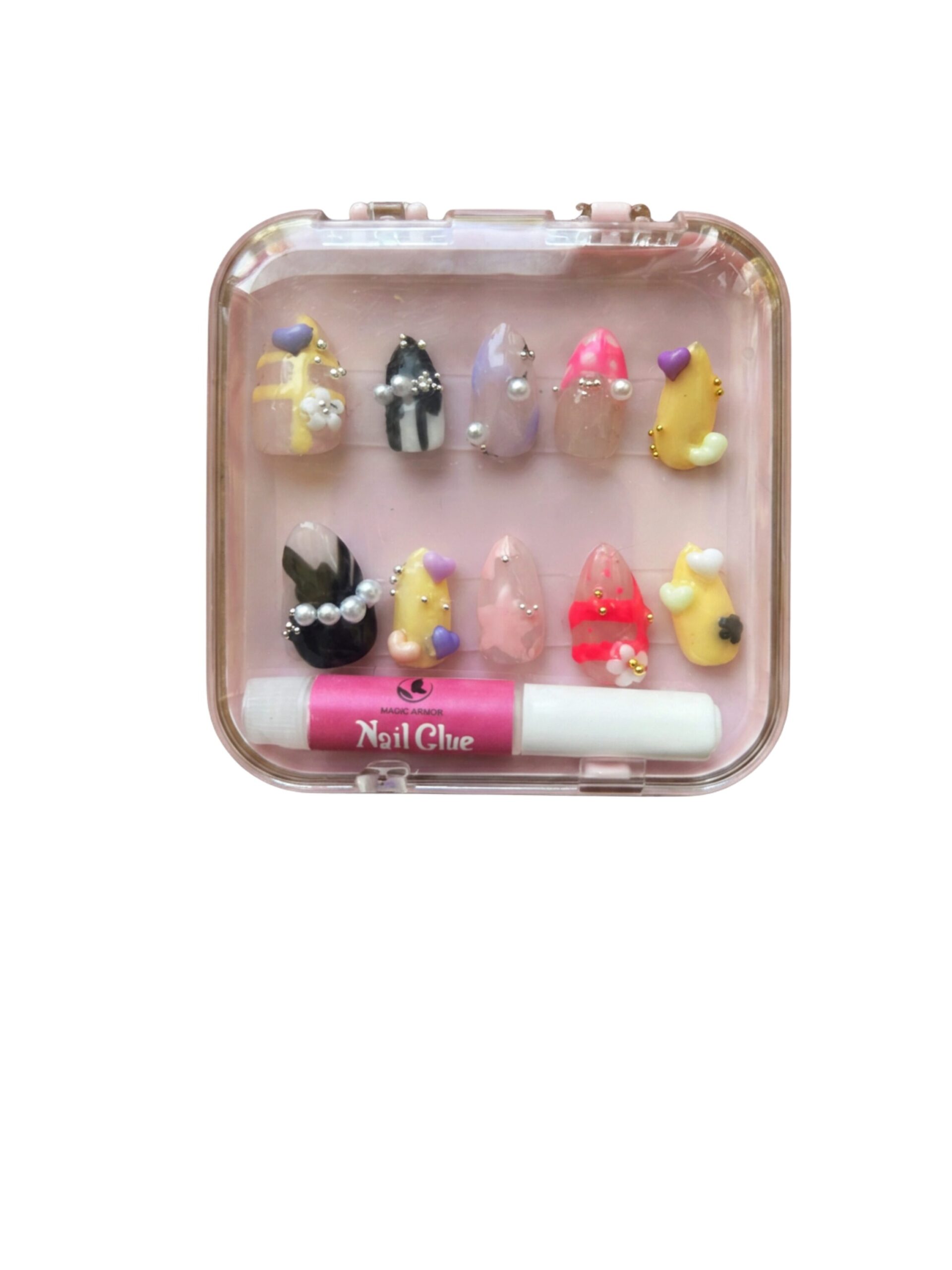 Pink plastic nail art case displaying assorted decorated press-on nails and a tube of nail glue inside